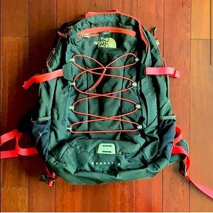 Used army green and hot pink north face back pack